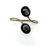 A micromosaic bangle composed of two oval onyx plates