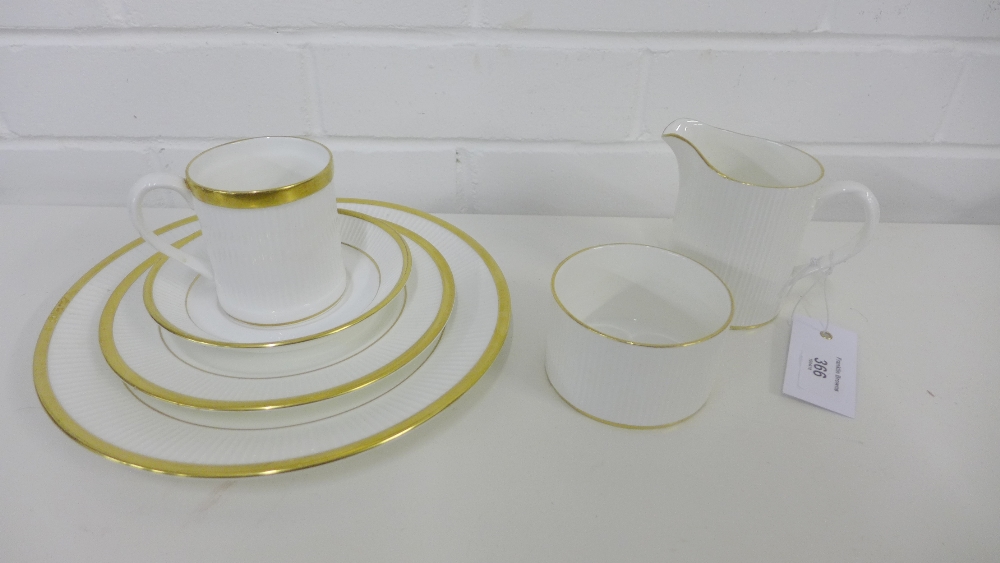 A Crown Staffordshire Golden Glory coffee set comprising twelve coffee cans, twelve saucers,