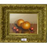 O. Lima Still Life of Oranges and Cherries oil-on-board, signed in a gilt wood frame 22cm x 16cm