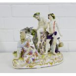 A continental porcelain figure group depicting Bacchus and Silenus, with the Drunken Silenus