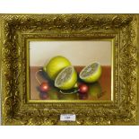 O. Lima Still Life of Lemons and Cherries signed bottom right, in a gilt wood frame 20cm x 16cm