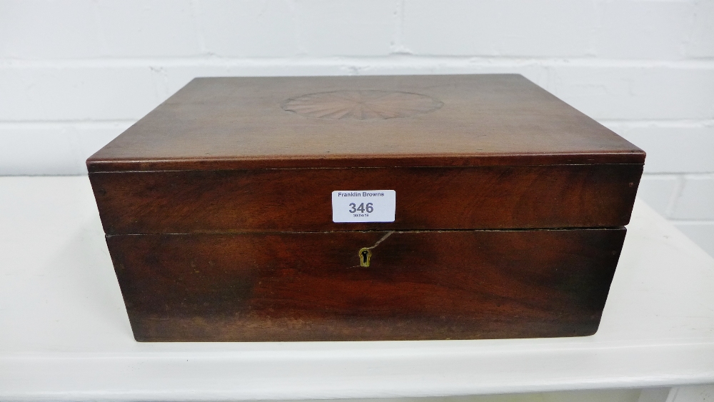 A 19th century mahogany work box the hinged lid with an inlaid paterea to centre, 33cm x 14cm
