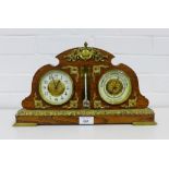 An oak cased and gilt metal mounted clock and barometer, with enamel dials with a brass