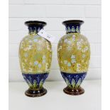 A pair of Doulton Lambeth stoneware Slaters patent baluster vases typically decorated with