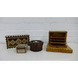 A collection of inlaid trinket boxes together with a musical cigarette box and a turned wood