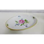 Meissen porcelain oval gilt edged dish painted with a rose spray to centre, 19cm x 14cm