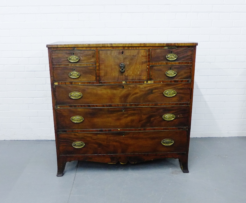 A 19th century mahogany Scotch chest the rectangular top over a central hat drawer flanked by two
