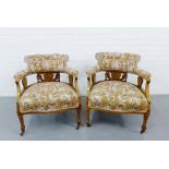 A pair of mahogany and inlaid open armchairs with tapestry upholstered backs, arms and seats with