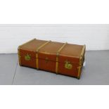 A painted and wooden bound steamer trunk with brown leather carry handles to side, 90cm x 50cm