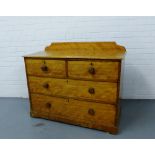 A pine ledgeback chest with two short over two long drawers on a plinth base, 88cm x 108cm