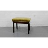 An upholstered topped piano stool, 43cm x 54cm