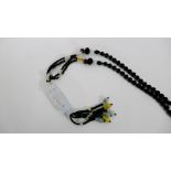 Black beads and jadeite necklace
