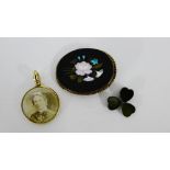 A 9 carat gold framed circular locket panel together with a Pietra Dura plaque brooch and a