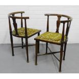 A pair of mahogany and inlaid splat back corner chairs with upholstered seats on tapering