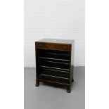 A mahogany shoe rack in the manner of Whytock and Reid the rectangular top over a single drawer on