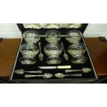 A cased crystal grapefruit set comprising six etched crystal dishes together with a set of six