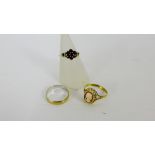 9 carat gold garnet set flowerhead ring, 9 carat gold cameo plaque ring and a gold wedding band (3)