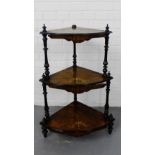 A 19th century burr wood three tier whatnot with inlaid friezes on turned supports, 86cm x 62cm