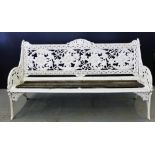 A Coalbrookdale Horse Chestnut pattern white painted cast iron garden bench with wooden slatted