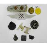 A mixed lot to include a WWI Imperial German Naval Wound Badge in silver, a WWII Nazi Third Reich