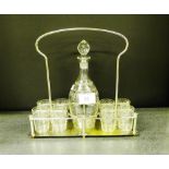 An etched glass miniature decanter and set of six shot glasses complete with an Epns stand