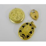 Two Victorian yellow metal mourning lockets, together with a 9ct gold heart shaped padlock (3)