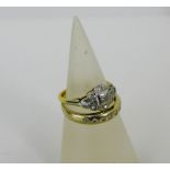 An 18ct white gold seven stone diamond ring, together with an unmarked yellow metal diamond set