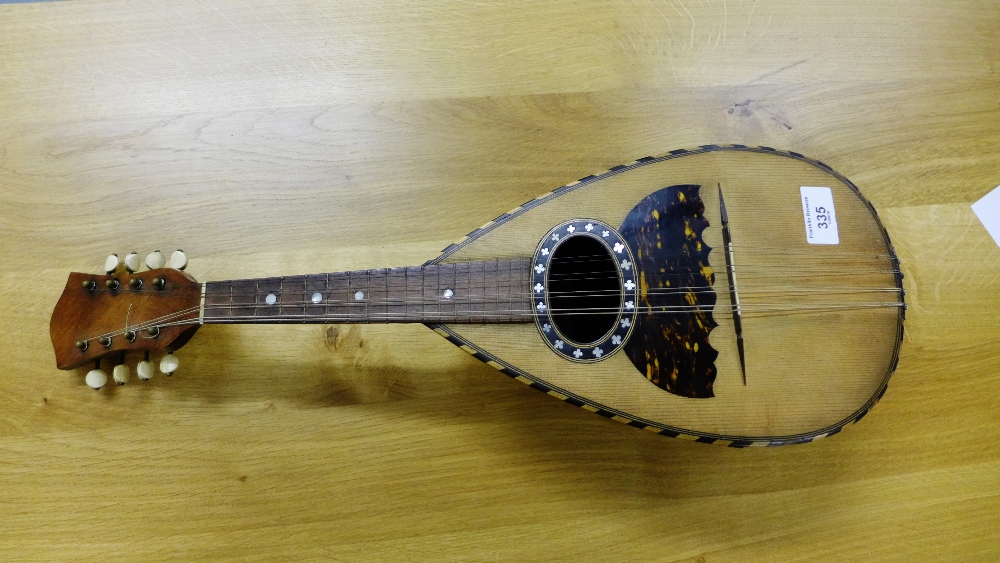 A Ferrari & Co Napoli Mandolin with tortoiseshell and mother-of-pearl inlay and bone tuning pegs,