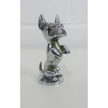 Chromed metal Bonzo style dog mascot, on circular plinth base, 8cm high