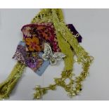 An early 20th century beaded neck trim, two floral silk handkerchiefs and a paste set butterfly (a