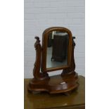 A 19th century mahogany dressing mirror of carved scroll support, 54 x 54cm