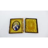 An oval portrait miniature depicting 'The Virgin Mary' in a small leather frame