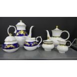 Caverswall fine bone china coffee pot with matching milk and sugar, the white glazed porcelain