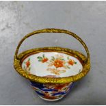 A Chinese Imari miniature porcelain bowl with gilt metal swing handle