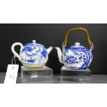 Two blue and white miniature teapots (2)