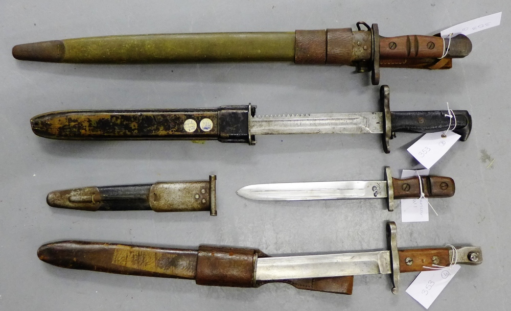 A collection of four American bayonets, two stamped to the ricasso Remington 1918 & 1917, one