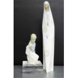 A Lladro figure of a boy in a cloak, modelled kneeling, together with a Lladro style figure of a