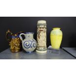 A mixed lot to include a copper lustre jug, a West German blue and white tavern jug, a German