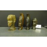 A group of four African hardwood busts (4)