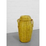 A wicker 'Ali Baba' type twin handled laundry basket