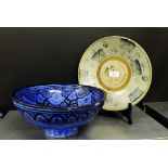 A North African blue glazed pottery bowl together with a pale blue stoneware provincial Chinese