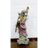 A Lladro gres glazed figure of an 'Immortal', modelled standing carrying lotus flower, 58cm high