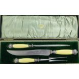 A three piece carving set in leather fitted case