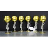 A set of six Italian wine glasses, the gilded bowls on opaque glass female figure supports, 16cm