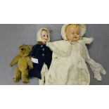 A vintage Chad Valley teddy bear together with a French bisque head doll and a celluloid doll (3)