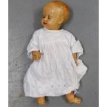 A 1950's celluloid baby doll