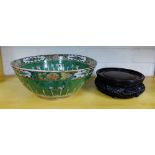 A Chinese canton enamel bowl, the green ground with butterflies and flowers in coloured enamels with
