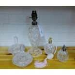 A mixed lot of cut crystal to include a table lamp base, two scent bottles and a pair of powder