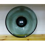 An Art Glass bowl in smoked grey colour on a plain foot rim, 33cm diameter