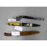 Two Trench knives to include one with a horn handle and the other stamped Gottlieb Hamnessfahr